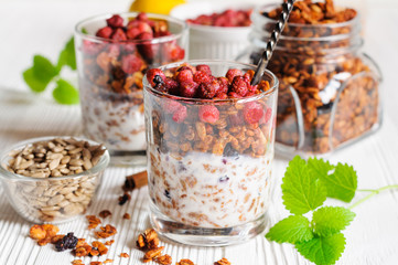 Homemade granola in open glass jar