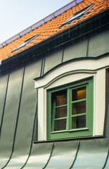 Tile roof and attic window. 