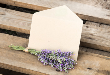 Flowers on wooden background.