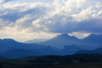 Clouds and blue mountains