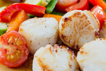 Cooked Scallops with stir fried vegetables