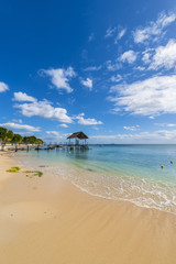Mauritius beach thatch jetty. Tropical Mauritius island water & beach resort, Turtle Bay - Balaclava