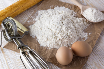 Eggs, a Hand Mixer and Flour.