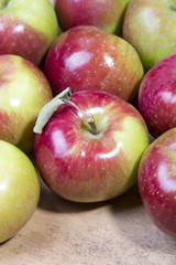 tasty apples on a wooden background