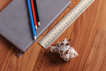 Crayons, a ruler and Notepad closeup