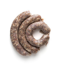homemade raw sausages isolated on a white background