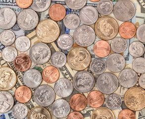 Background of american coins on american dollars