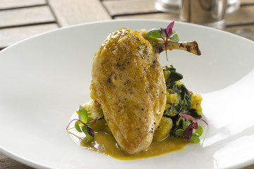 Corn fed chicken with sag aloo & curry veloute
