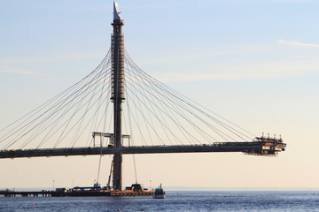 construction of bridge at sunset