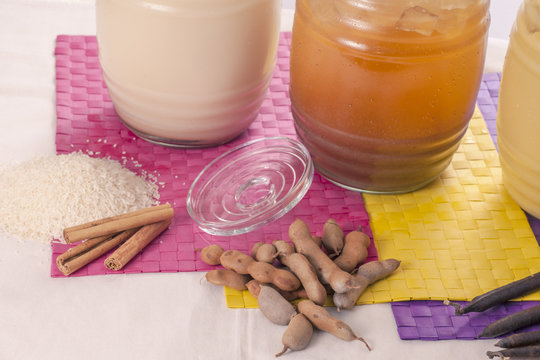 Close up of horchata,tamarind and vanilla beverages.