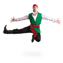 Jumping man wearing a pirate costume. Isolated on white in full length.