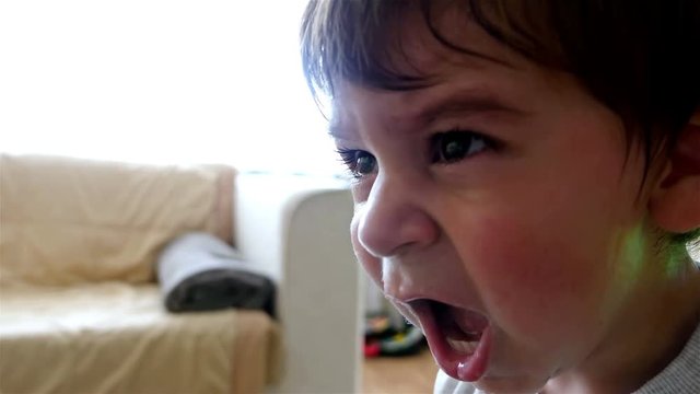 Little boy crying inconsolably