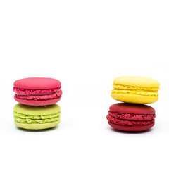 Sweet and colourful french macaroons or macaron on white background