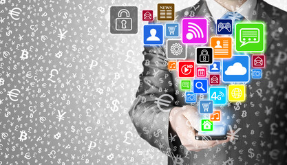 Business man using smart phone with social media icon set