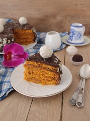 carrot cake with apple cream and chocolate glaze