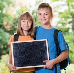  Boy and girl with blackboard