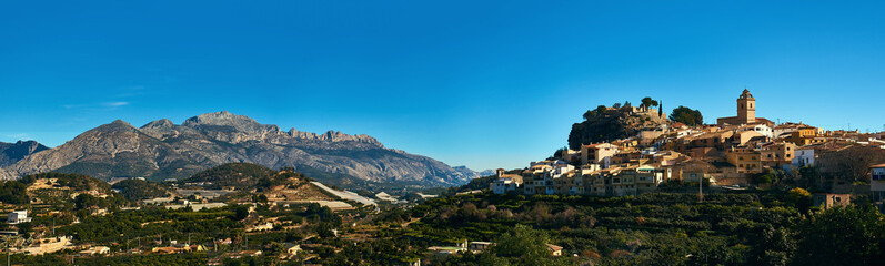 Fototapeta na wymiar Panorama of hillside village Polop de la Marina. Spain