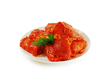 Raw Meat. Pork slices marinated with spices, pepper and sauce. Shashlik dish isolated on white background