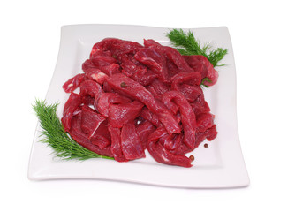 Raw Meat. Uncooked fresh beef slices isolated on white