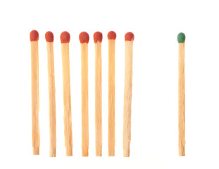 Set of seven red wooden matches and one green
