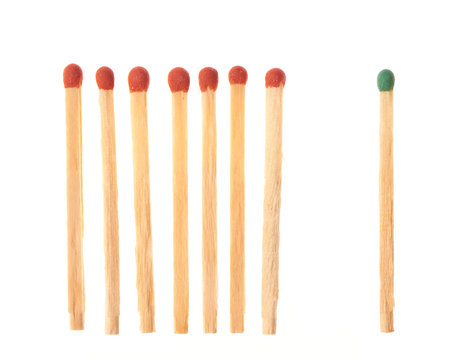 Set of seven red wooden matches and one green