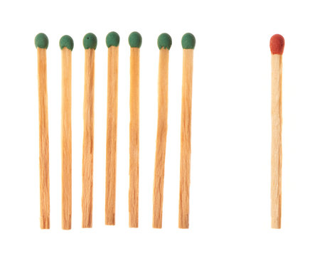 Set of seven green wooden matches and one red