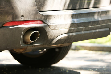Exhaust pipe and back part of a car