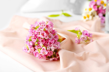 Beautiful bouquet on pink napkin