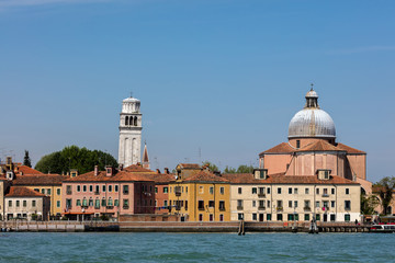 Naklejka premium 16th century Basilica of St Peter of Castello with it's leaning campanile made of white Istrian stone, located in the Castello district of Venice.