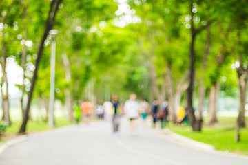 Blurred background ,People exercise in park ,pale vintage filter