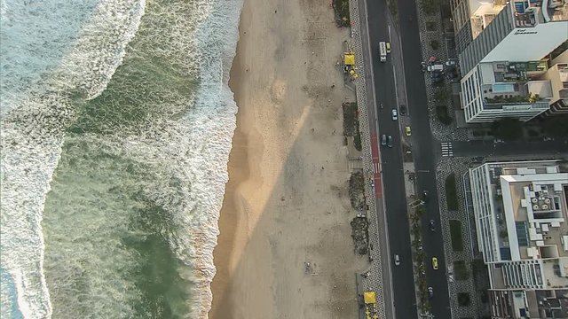 Flying directly above Ipanema Beach sidewalk, Rio de Janeiro, Brazil