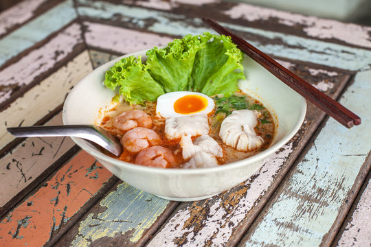 Seafood Tomyum noolde  and boil egg Thailand Food yummy