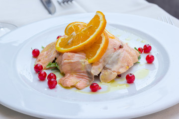 Salmon marinated into orange