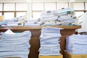 Messy office desk, Pile of unfinished paperworks