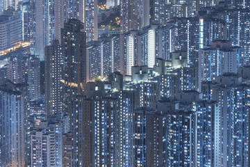 Highrise residential buildings in Hong Kong city at night