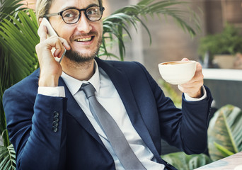 Sitting business Man Drinking Coffee