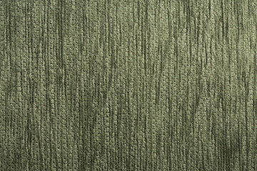 Фон из синтетической ткани зелёного цвета крупным планом
