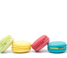 Sweet and colourful french macaroons or macaron on white background