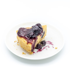 Blueberry cheesecake on white background