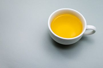 Obraz na płótnie Canvas white Tea cup on Gray colour background.