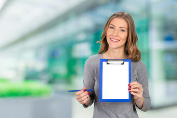 Young Woman With Pen and Note Pad