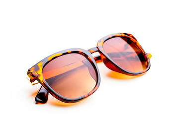 Sunglasses in leopard frame isolated on white background