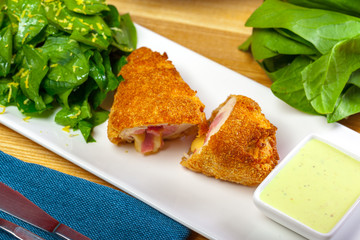 Breaded cutlet served on a plate