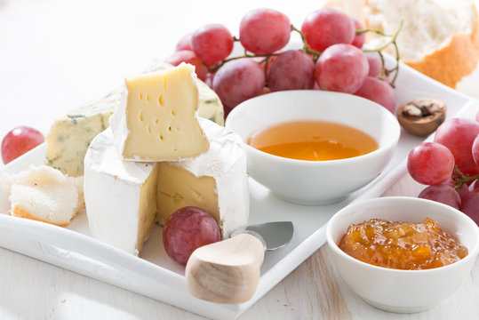 molded cheeses, fruit and snacks, closeup