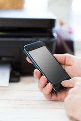 Unrecognizable man using mobile phone