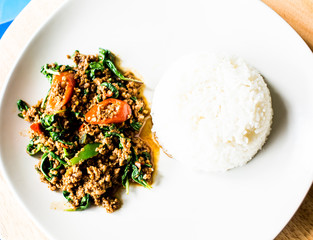 Rice topped with stir-fried pork and basil
