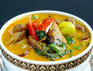 thai food - gaeng phet ped yang - red curry with roast duck