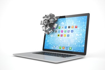Tied laptop with silver bow on white background. Modern present or gift for birthday, holiday, christmas. 3D rendering.