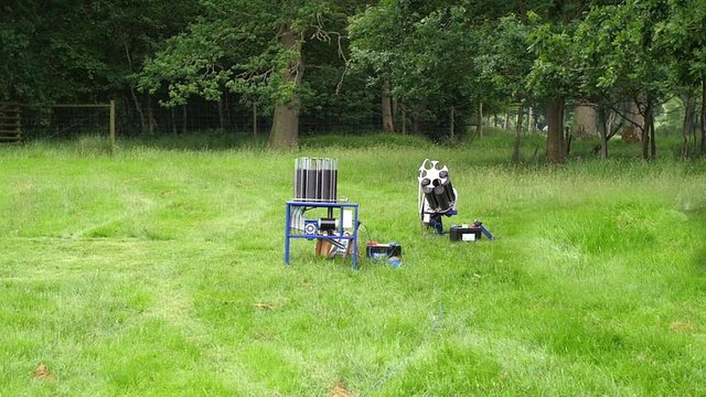 Slow motion view of automatic trap thrower for clay pigeon shooting in action