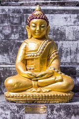thai old golden buddha statue